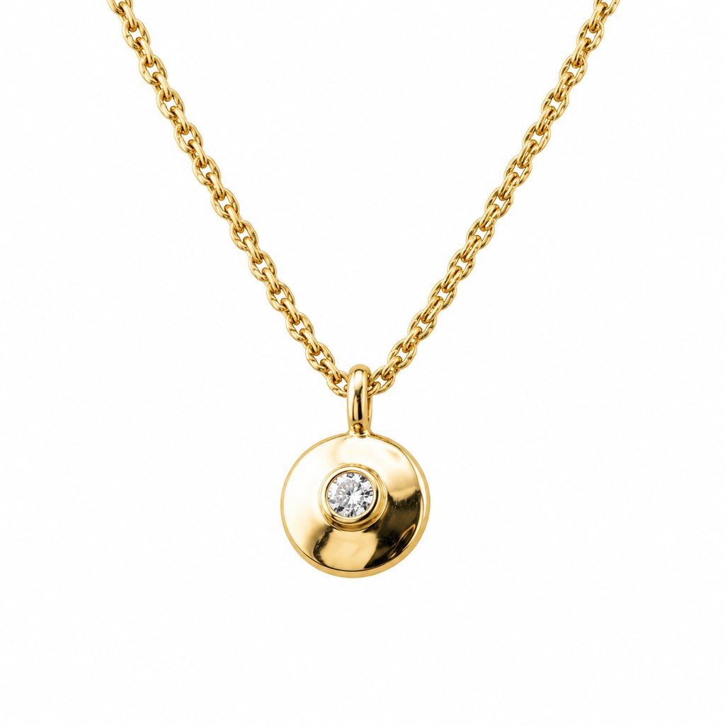 The gold pendant necklace on a plain white background